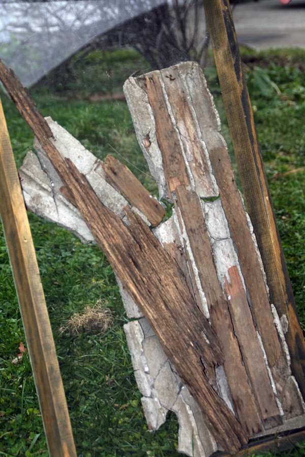 Figure 26-4: Robert Smithson’s Partially Buried Woodshed, created on the Kent State University campus, became a magnet of local history.